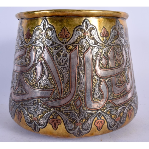 254 - AN ANTIQUE MIDDLE EASTERN CAIRO WARE BRASS BOWL decorated with Kufic script. 13 cm x 13 cm.