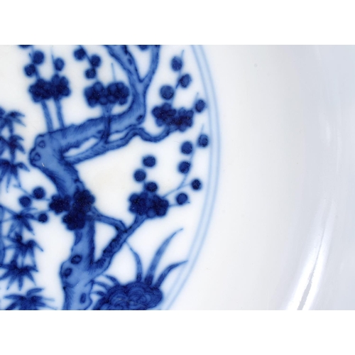 258 - A 19TH CENTURY CHINESE FAMILLE ROSE OCTAGONAL TAZZA together with a blue and white dish. Largest 17 ... 