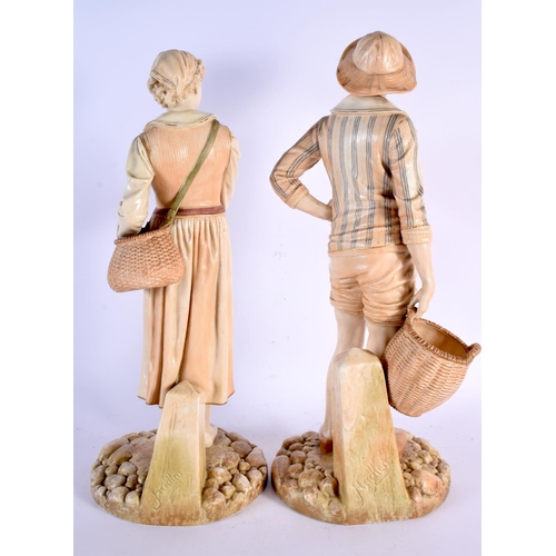 260 - A LARGE PAIR OF HADLEY ROYAL WORCESTER BLUSH IVORY FIGURES modelled with baskets. 45 cm x 15 cm.