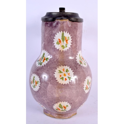 267 - A LARGE 18TH CENTURY CONTINENTAL FAIENCE POTTERY STEIN painted with motifs. 26 cm x 12 cm