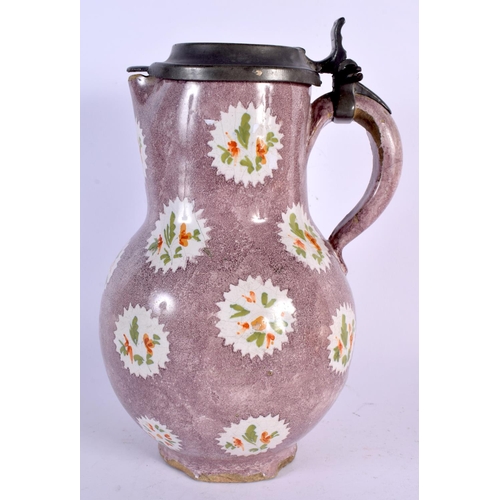 267 - A LARGE 18TH CENTURY CONTINENTAL FAIENCE POTTERY STEIN painted with motifs. 26 cm x 12 cm