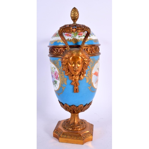 268 - A 19TH CENTURY FRENCH PARIS PORCELAIN VASE AND COVER painted with putti upon a blue ground. 28 cm x ... 