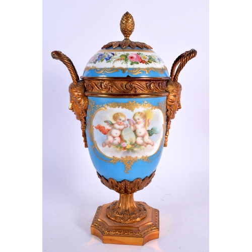 268 - A 19TH CENTURY FRENCH PARIS PORCELAIN VASE AND COVER painted with putti upon a blue ground. 28 cm x ... 