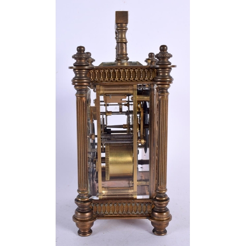 274 - AN ANTIQUE REPEATING FRENCH BRASS CARRIAGE CLOCK. 18 cm high.