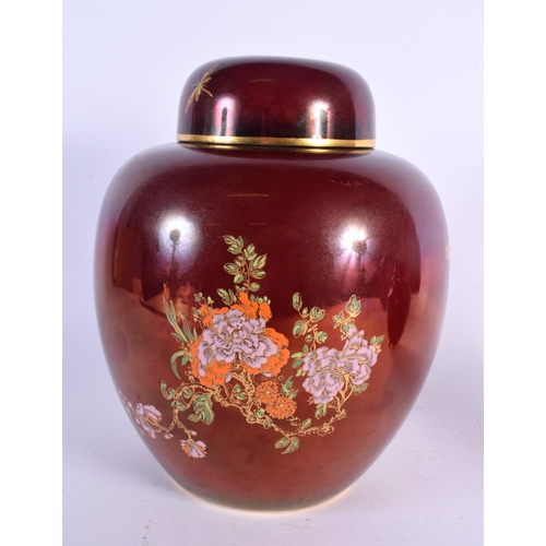 284 - AN ART DECO CARLTONWARE GINGER JAR AND COVER together with a similar vase. Largest 23 cm x 13 cm. (2... 