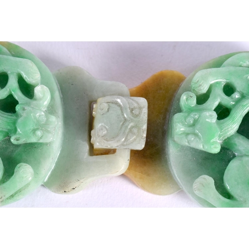 285 - A 19TH CENTURY CHINESE CARVED JADEITE BELT BUCKLE Qing. 11 cm x 3 cm.