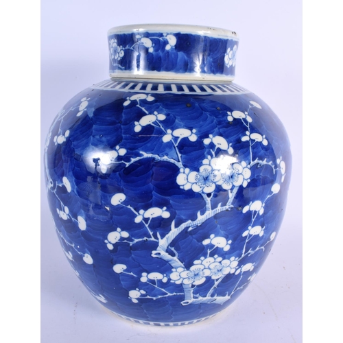 289 - A LARGE 19TH CENTURY CHINESE BLUE AND WHITE PORCELAIN GINGER JAR AND COVER bearing Kangxi marks to b... 