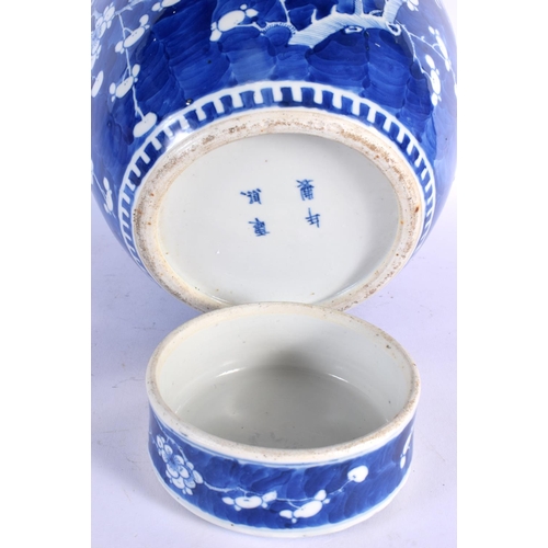 289 - A LARGE 19TH CENTURY CHINESE BLUE AND WHITE PORCELAIN GINGER JAR AND COVER bearing Kangxi marks to b... 