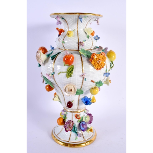 29 - A LARGE 19TH CENTURY MEISSEN PORCELAIN VASE encrusted with flowers. 24 cm x 12 cm.