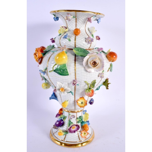 29 - A LARGE 19TH CENTURY MEISSEN PORCELAIN VASE encrusted with flowers. 24 cm x 12 cm.