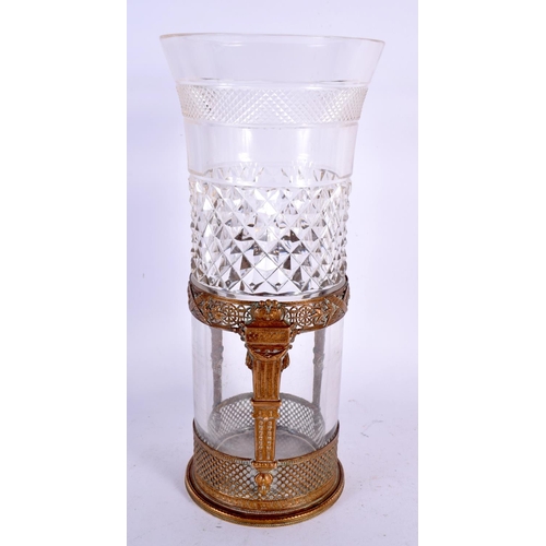 296 - AN ANTIQUE FRENCH GILT METAL MOUNTED CUT GLASS VASE of neo classical design. 25 cm high.