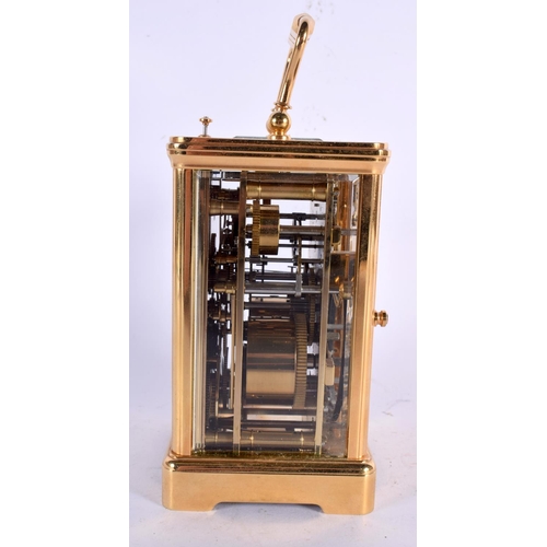 297 - AN ANGELUS REPEARTING MOON PHASE CARRIAGE CLOCK. 17 cm high inc handle.