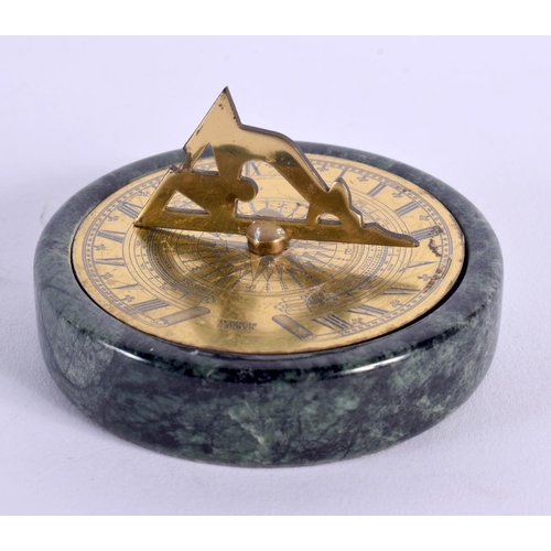 311 - AN UNUSUAL ANTIQUE MINIATURE POCKET GARDEN SUNDIAL upon a marble plinth. 6.5 cm diameter.