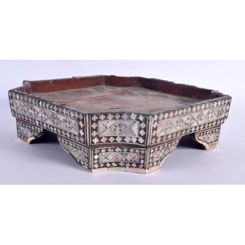 340 - AN 18TH/19TH CENTURY MIDDLE EASTERN OTTOMAN MOTHER OF PEARL STAND decorated with foliage. 22 cm x 24... 