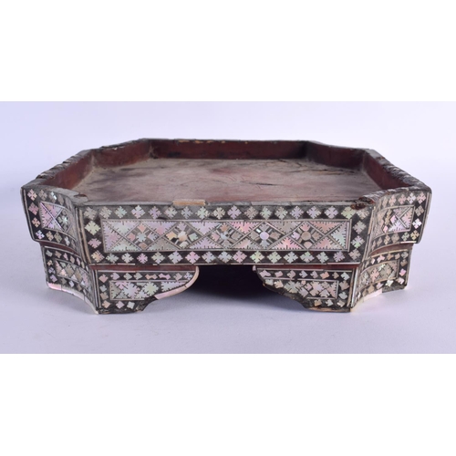 340 - AN 18TH/19TH CENTURY MIDDLE EASTERN OTTOMAN MOTHER OF PEARL STAND decorated with foliage. 22 cm x 24... 