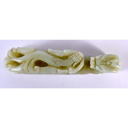 344 - A CHINESE QING DYNASTY CARVED JADE BELT HOOK together with a porcelain box and cover. Largest 14 cm ... 