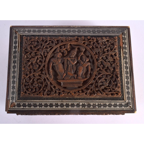 345 - A 19TH CENTURY ANGLO INDIAN CARVED SANDALWOOD CASKET decorated with figures. 21 cm x 14 cm.