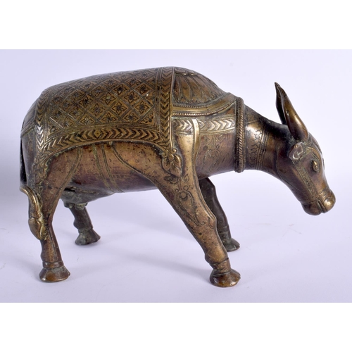 347 - A FINE 18TH CENTURY INDIAN BRONZE FIGURE OF A BULLOCK  modelled wearing floral embellished robes. 25... 