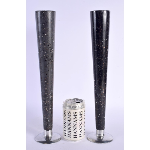 354 - AN UNUSUAL PAIR OF RETRO 1970S IMITATION FOSSILISED MARBLE VASES with chrome bases. 38 cm high.