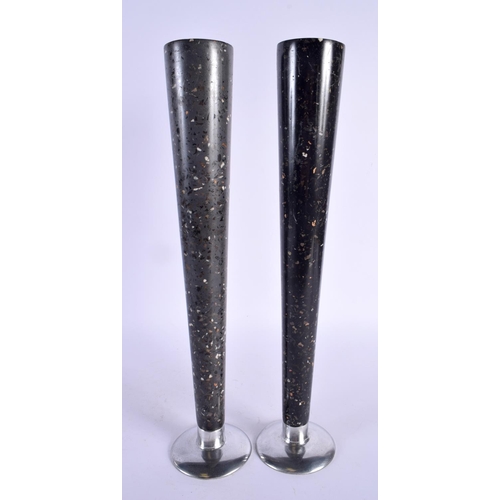 354 - AN UNUSUAL PAIR OF RETRO 1970S IMITATION FOSSILISED MARBLE VASES with chrome bases. 38 cm high.