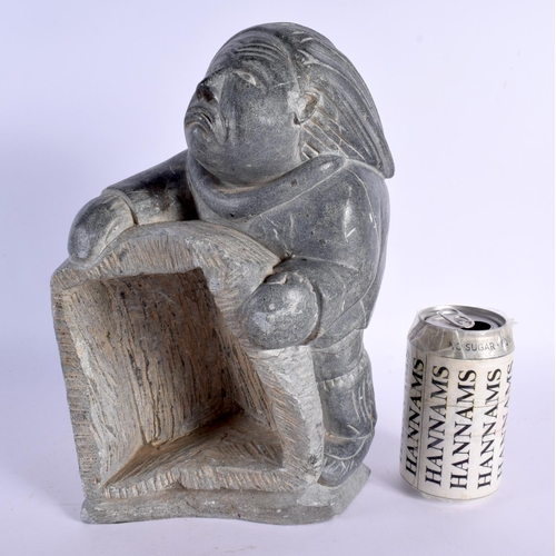 358 - AN UNUSUAL LARGE NORTH AMERICAN INUIT CARVED STONE FIGURE modelled as an hunter. 30 cm x 13 cm.