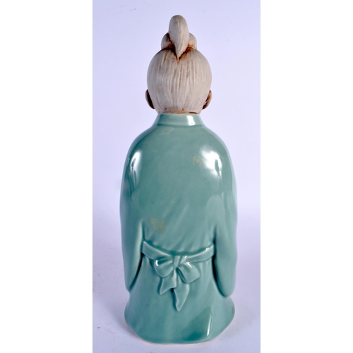 366 - AN UNUSUAL EARLY 20TH CENTURY JAPANESE TAISHO PERIOD CELADON PORCELAIN FIGURE modelled as a young bo... 