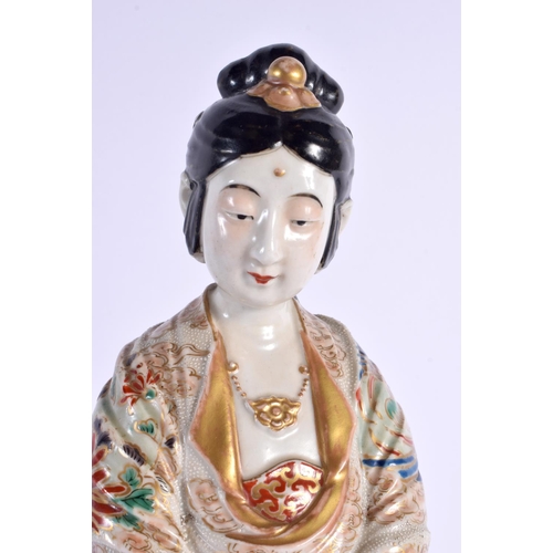 367 - A LARGE 19TH CENTURY JAPANESE MEIJI PERIOD SATSUMA FIGURE OF A FEMALE modelled in embellished robes.... 