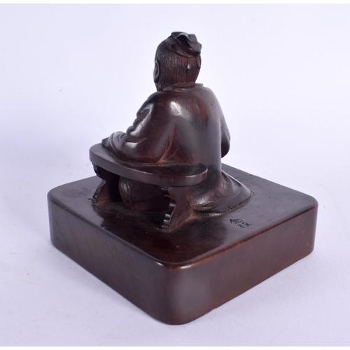 368 - A VERY UNUSUAL 19TH CENTURY CHINESE CARVED HARDWOOD SEAL Qing, possibly Zitan, modelled as a seated ... 