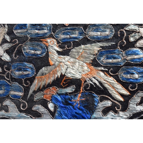 369 - A 19TH CENTURY CHINESE SILKWORK EMBROIDERED DOUBLE RANK BADGE depicting birds amongst foliage. 48 cm... 