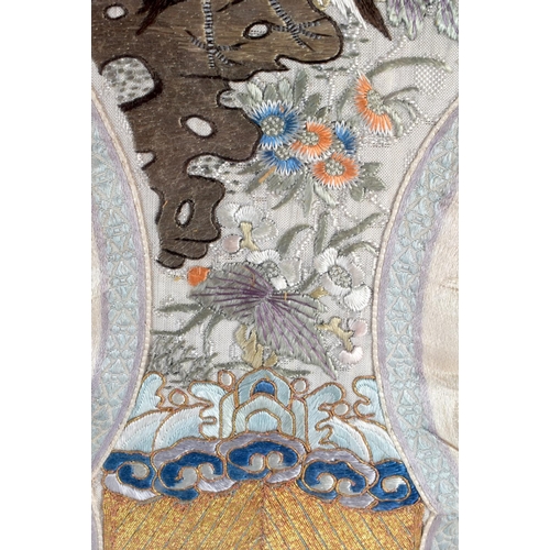 372 - A 19TH CENTURY CHINESE SILKWORK EMBROIDERED PANEL Qing, depicting birds within landscapes. 60 cm x 3... 