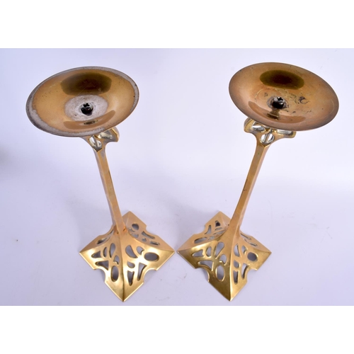 381 - A LARGE PAIR OF ARTS AND CRAFTS BRASS CANDLESTICKS. 34 cm high.