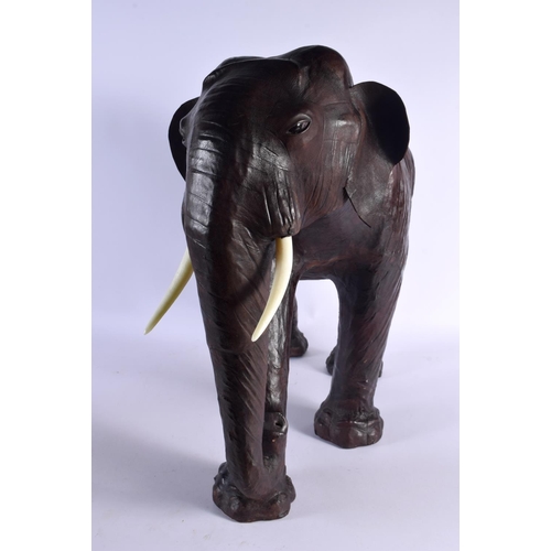 382 - A FINE LARGE EARLY 20TH CENTURY LIBERTY OF LONDON LEATHER ELEPHANT by Dimitri Omersa for Abercrombie... 