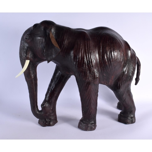 382 - A FINE LARGE EARLY 20TH CENTURY LIBERTY OF LONDON LEATHER ELEPHANT by Dimitri Omersa for Abercrombie... 