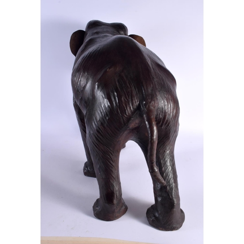 382 - A FINE LARGE EARLY 20TH CENTURY LIBERTY OF LONDON LEATHER ELEPHANT by Dimitri Omersa for Abercrombie... 