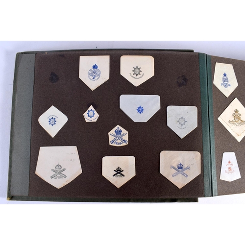 386 - A COLLECTION OF WWI MILITARY REGIMENTAL CUT OUTS together with photographs and a watercolour of Ypre... 