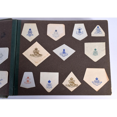 386 - A COLLECTION OF WWI MILITARY REGIMENTAL CUT OUTS together with photographs and a watercolour of Ypre... 