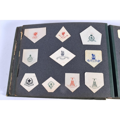 386 - A COLLECTION OF WWI MILITARY REGIMENTAL CUT OUTS together with photographs and a watercolour of Ypre... 