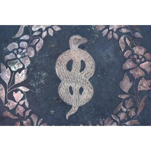 399 - A 19TH CENTURY MIDDLE EASTERN INDIAN SILVER INLAID BRONZE DISH depicting a serpent. 16 cm diameter.