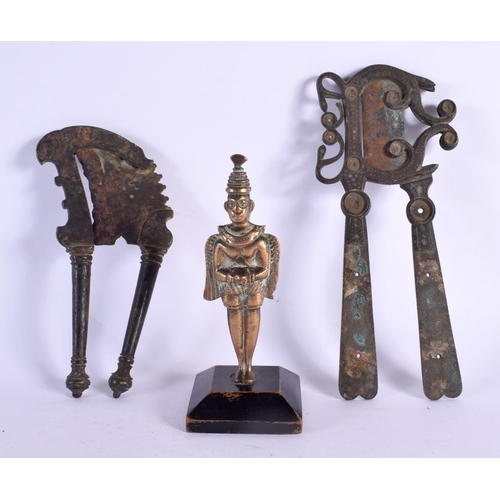 411 - TWO 19TH CENTURY MIDDLE EASTERN BEETLE NUT CRACKERS together with a bronze buddhistic deity. Largest... 