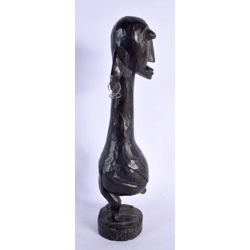 415 - AN AFRICAN TRIBAL CARVED WOOD FERTILITY FIGURE. 30 cm high.