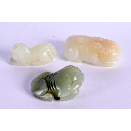 425 - THREE 19TH CENTURY CHINESE CARVED JADE BEASTS Qing. Largest 6 cm x 3 cm. (3)