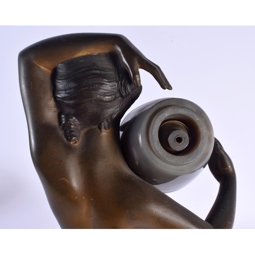 431 - A LOVELY LARGE ART DECO BRONZE AND AGATE FIGURAL LAMP OF A FEMALE modelled holding an over turned am... 