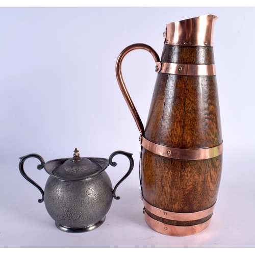 432 - AN EGYPTIAN REVIVAL TWIN HANDLED SILVER PLATED SUCRIER AND COVER together with an Edwardian oak jug.... 