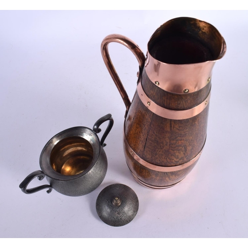 432 - AN EGYPTIAN REVIVAL TWIN HANDLED SILVER PLATED SUCRIER AND COVER together with an Edwardian oak jug.... 