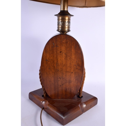 436 - A CHARMING LARGE EARLY 20TH CENTURY MARITIME LAMP overlaid with a brass anchor. 80 cm high.