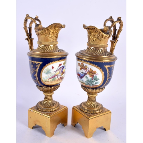 438 - A FINE PAIR OF LATE 18TH CENTURY ENGLISH PORCELAIN AND GILT BRONZE EWERS probably Giles Worcester. 2... 