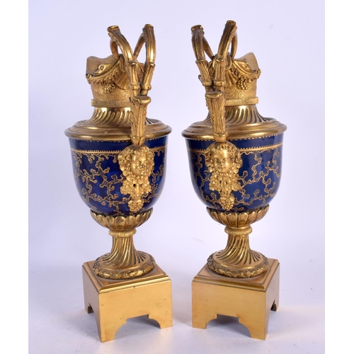 438 - A FINE PAIR OF LATE 18TH CENTURY ENGLISH PORCELAIN AND GILT BRONZE EWERS probably Giles Worcester. 2... 