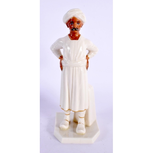 44 - A ROYAL WORCESTER PORCELAIN FIGURE OF AN INDIAN MALE. 17 cm high.