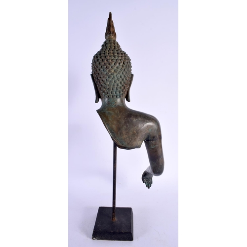 446 - A 19TH CENTURY THAI BRONZE BUDDHA FRAGMENT elegantly modelled with draped hands. 42 cm high.