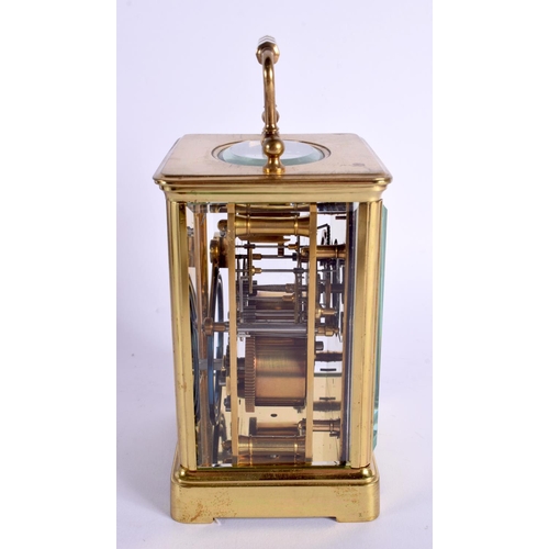 456 - AN ANTIQUE LEATHER CASED BRASS CARRIAGE CLOCK. 18 cm high inc handle.